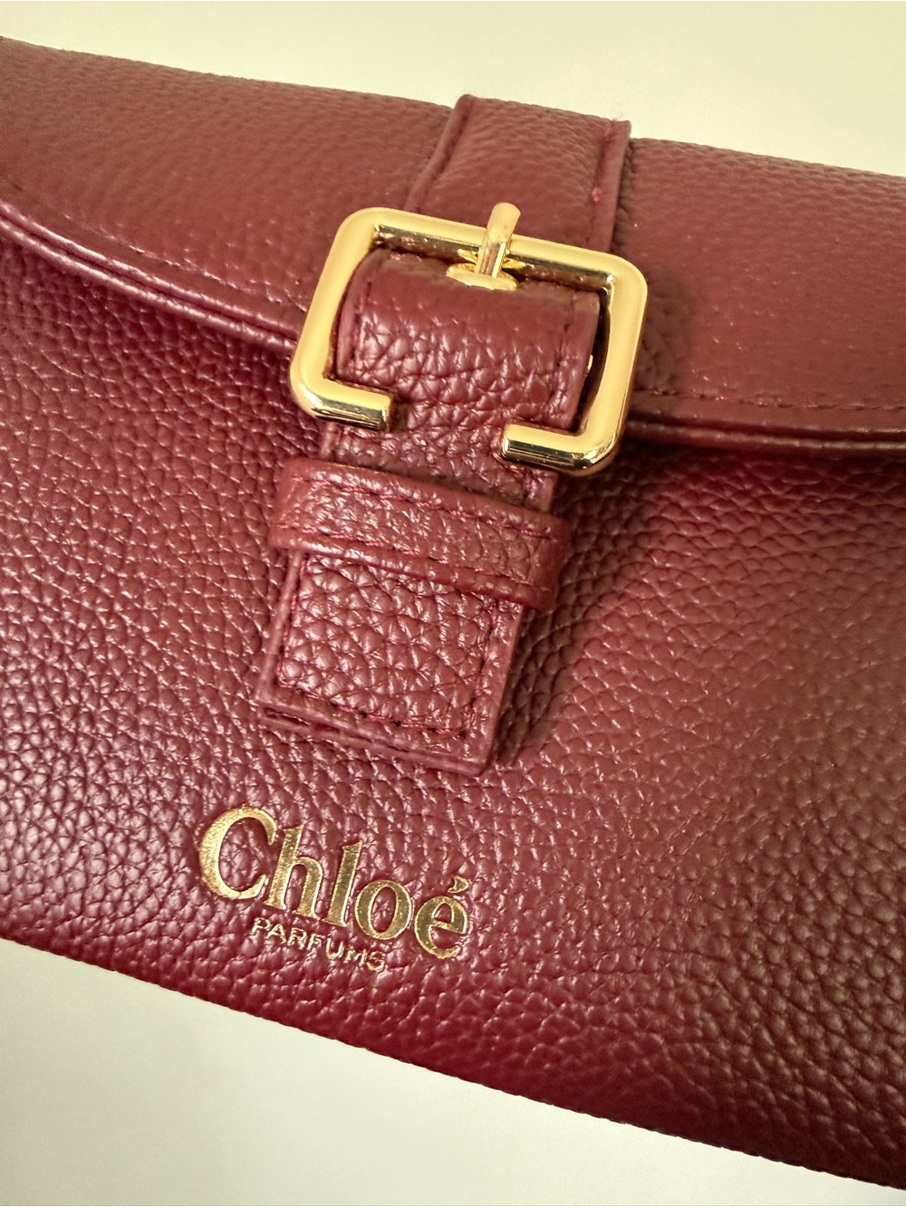 Chloé Parfums Burgundy Pebbled Leather Buckle Wallet - Picture 7 of 11